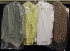 A collection of shirts and coats to include Pakeman Cato & Carter, The Saville Row Company,