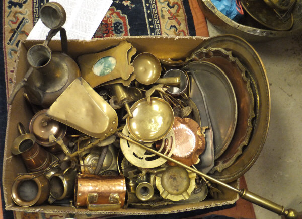 A box of assorted brass and copper wares to include various salvers, photo frames, fire tools, jugs,