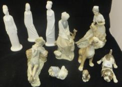 A collection of seven Lladro figures including woman seated with bird, woman seated with dog,