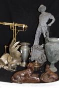 A collection of various metal wares to include Spelter Fisherman, Spelter vase, wine pourer,