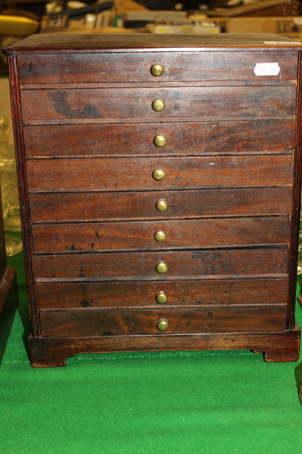 A Victorian mahogany nine drawer collectors chest