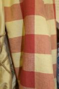 A single interlined curtain in a red and yellow check