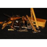 A box of assorted mid-Victorian and later bone and wooden-handled tools to include perforators,
