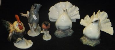 A collection of Rosenthal bird figures including "A pair of fan-tailed Pigeons", "Cockerel",