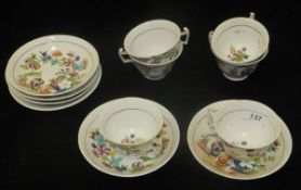 A set of six early 19th Century English pottery teacups and saucers with polychrome chinoiserie