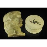 A 19th Century cast marble bust plaque of a Roman emperor wearing a laurel wreath in profile, 12.