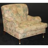 A Derwent floral upholstered armchair in the Howard manner,