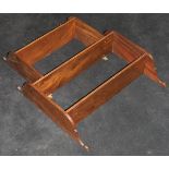 A 19th Century mahogany three tier wall shelf, the carved top above three shelves,