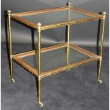 A 19th Century lacquered brass étagère with replacement bevel edged glazed panels,