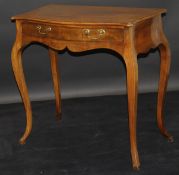 A George III "French Hepplewhite" mahogany serpentine fronted side table with single drawer shaped