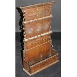 A 19th Century carved oak spoon rack in the 17th Century style,