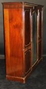 An early 20th Century mahogany triple mirrored door wardrobe compactum 209cm wide and a