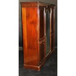 An early 20th Century mahogany triple mirrored door wardrobe compactum 209cm wide and a