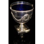 A Victorian silver pierced sugar basket with swing handle, raised on pedestal base to square foot,