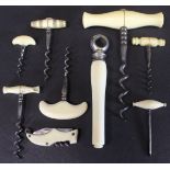 A collection of miniature bone / ivory handled T bar type travelling corkscrews, a larger version,