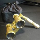 A pair of gilt brass and mother of pearl mounted opera glasses