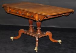 An early 19th Century mahogany sofa table,