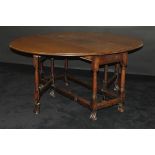 A 19th Century walnut oval gate-leg drop-leaf dining table in the circa 1700 Flemish manner,