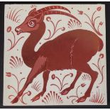 William De Morgan glazed pottery tile decorated in ruby lustre with an antelope,