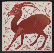William De Morgan glazed pottery tile decorated in ruby lustre with an antelope,