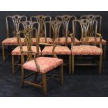 A set of eight 19th Century mahogany dining chairs in the Chippendale taste with over-stuffed seats