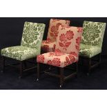 A set of four George III dining chairs with modern flock upholstery, two in red and two in green,