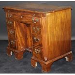 A 19th Century mahogany dressing table with applied moulded edge with single brushing slide above a