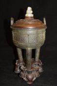 A 19th Century Chinese bronze censer with two loop handles,