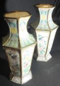 A pair of 19th Century Chinese enamelled vases of faceted hexagonal form each panel decorated with