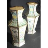 A pair of 19th Century Chinese enamelled vases of faceted hexagonal form each panel decorated with