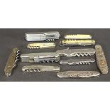A collection of various pocket knives to include two multi-tool knives,