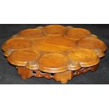 A Victorian carved oak lazy susan,