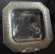 RENÉ LALIQUE square dish with canted corners, the rim, moulded as flower heads with clear centre,