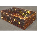 A 19th Century tortoiseshell box with hinged lid opening to reveal a plain interior, 15.1 cm x 1.