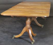 A 19th Century mahogany dining table,