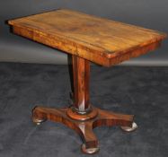 A 19th Century rosewood side table, the plain rectangular top above a plain frieze,