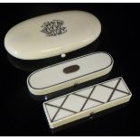 An ivory and gold mounted rectangular box with hinged lid opening to reveal a mirror and velvet set