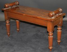 A mahogany window seat in the Victorian taste,