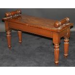 A mahogany window seat in the Victorian taste,