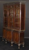 An Edwardian mahogany Chippendale Revival breakfront bookcase,