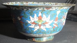 A Chinese cloisonné bowl, the centre decorated with dog of fo,