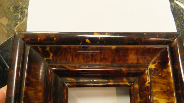 A box containing a tortoiseshell picture frame, 17.4 cm x 15. - Image 40 of 56