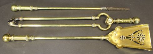 A set of three 19th Century brass fire irons to include shovel, poker and tongs,