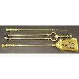 A set of three 19th Century brass fire irons to include shovel, poker and tongs,