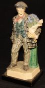A Charles Vyse glazed pottery figure "The Cineria Boy",