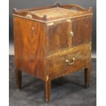 A George III mahogany night table with galleried top above two cupboard cross banded mahogany doors