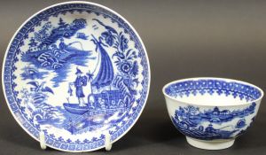 An 18th Century Worcester 'Fisherman with fish on a punt' tea bowl and saucer bearing blue crescent