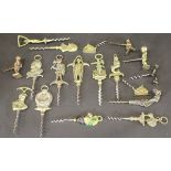A collection of figural decorated mainly brass handled corkscrews including Charles Dickens,