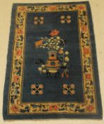 A Peking Chinese carpet,