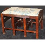 A mahogany stool in the George III taste, the upholstered drop-in seat,